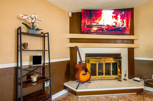 1061 Lowry Ave, Lakeland, FL 33801 - interior details with a tile fireplace and a textured ceiling