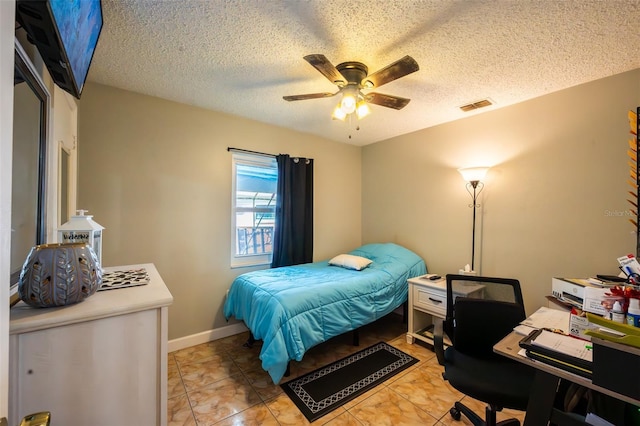 1061 Lowry Ave, Lakeland, FL 33801 - bedroom featuring a textured ceiling, visible vents, and a ceiling fan