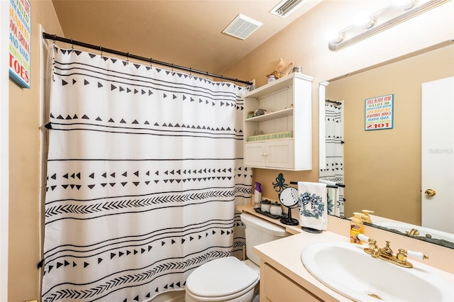 1061 Lowry Ave, Lakeland, FL 33801 - bathroom with curtained shower, vanity, toilet, and visible vents