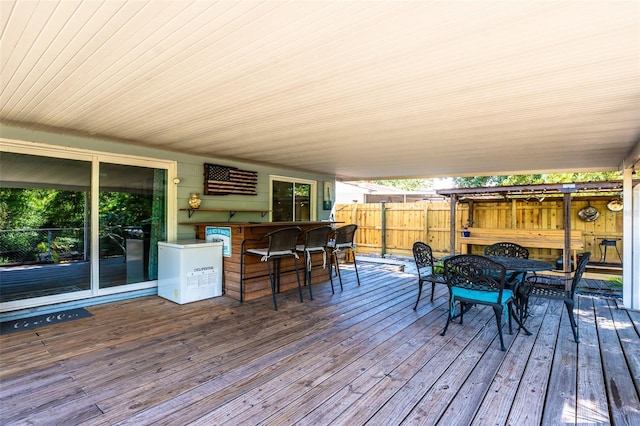 1061 Lowry Ave, Lakeland, FL 33801 - wooden deck with outdoor dry bar and fence
