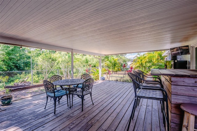 1061 Lowry Ave, Lakeland, FL 33801 - deck with a fenced backyard and outdoor dining space