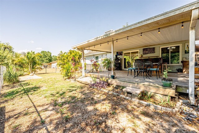 1061 Lowry Ave, Lakeland, FL 33801 - view of yard with fence and a wooden deck