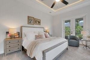 2551 Delphi Woods Cir, Lakeland, FL 33812 - carpeted bedroom featuring access to outside, french doors, a raised ceiling, ceiling fan, and ornamental molding