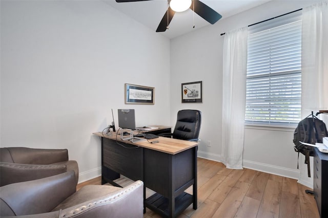 2551 Delphi Woods Cir, Lakeland, FL 33812 - office area with baseboards, light wood finished floors, and a ceiling fan