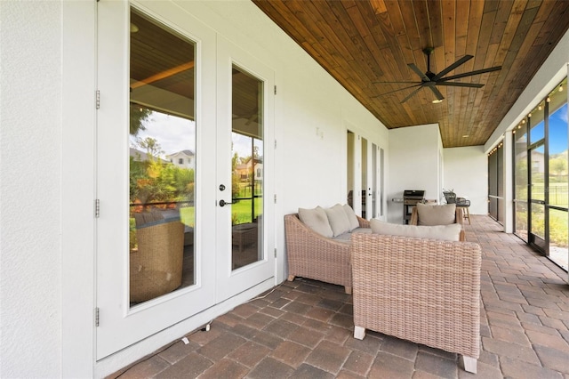 2551 Delphi Woods Cir, Lakeland, FL 33812 - sunroom / solarium with french doors, wood ceiling, and ceiling fan
