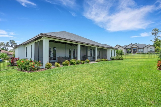 2551 Delphi Woods Cir, Lakeland, FL 33812 - rear view of house with a sunroom and a ceiling fan