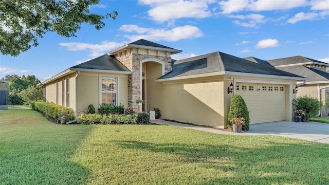 view of front of property featuring an attached garage, stucco siding, a front lawn, and driveway