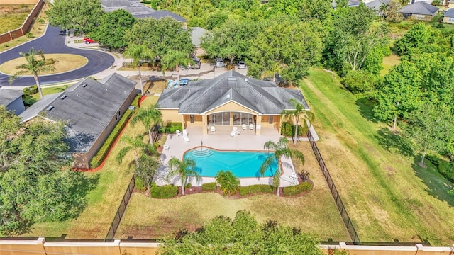 view of subject property featuring a pool