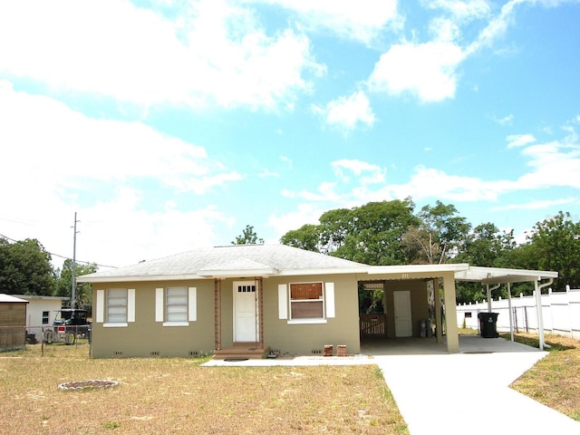 255 S Pennsylvania Ave, Lake Alfred, FL 33850 - view of front of home featuring a carport and driveway