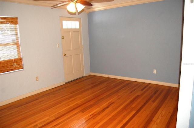 255 S Pennsylvania Ave, Lake Alfred, FL 33850 - unfurnished room with a ceiling fan, crown molding, wood finished floors, and baseboards