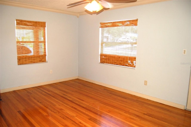 255 S Pennsylvania Ave, Lake Alfred, FL 33850 - spare room with ceiling fan, ornamental molding, wood finished floors, and baseboards