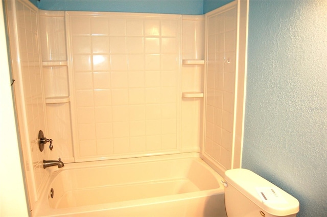 255 S Pennsylvania Ave, Lake Alfred, FL 33850 - full bathroom with a textured wall, toilet, and shower / bath combination