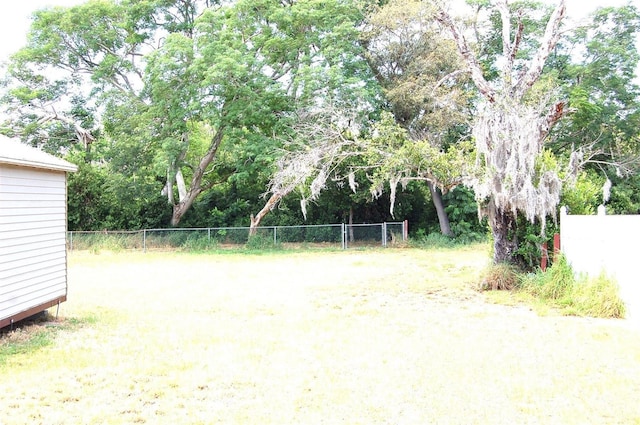 255 S Pennsylvania Ave, Lake Alfred, FL 33850 - view of yard featuring fence
