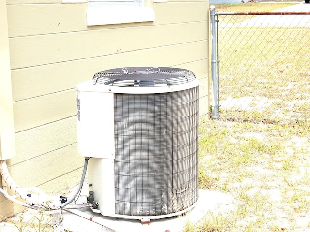 255 S Pennsylvania Ave, Lake Alfred, FL 33850 - exterior view of cooling unit and fence