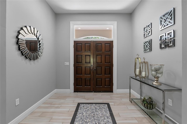 7313 Crape Myrtle Way, Sarasota, FL 34241 - entrance foyer featuring baseboards and wood finish floors
