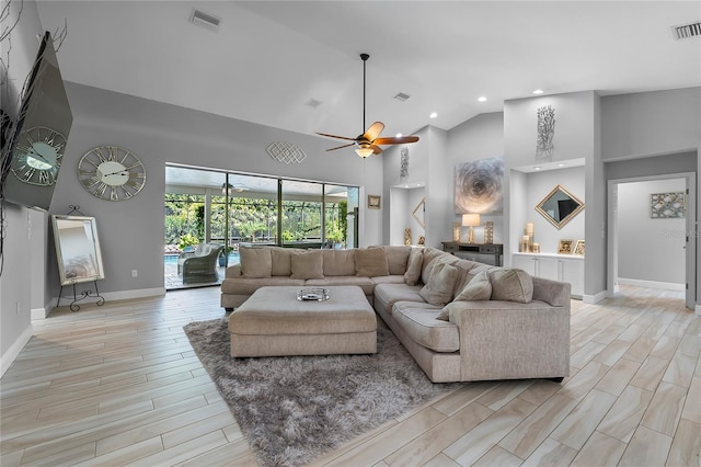 7313 Crape Myrtle Way, Sarasota, FL 34241 - living room featuring high vaulted ceiling, ceiling fan, light wood-style floors, baseboards, and recessed lighting