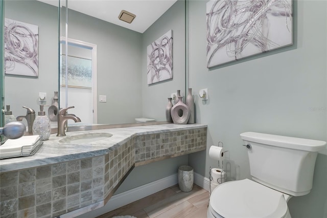 7313 Crape Myrtle Way, Sarasota, FL 34241 - bathroom featuring a sink and toilet