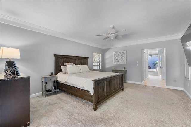 7313 Crape Myrtle Way, Sarasota, FL 34241 - bedroom featuring light colored carpet, crown molding, baseboards, ensuite bathroom, and ceiling fan