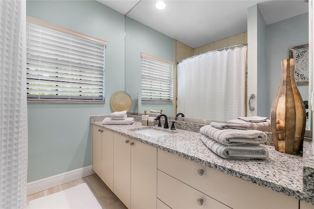 7313 Crape Myrtle Way, Sarasota, FL 34241 - bathroom featuring vanity, baseboards, a shower with shower curtain, and recessed lighting