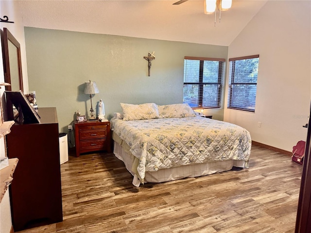 5619 Antler Trl, Lakeland, FL 33811 - bedroom with lofted ceiling, baseboards, a ceiling fan, and wood finished floors