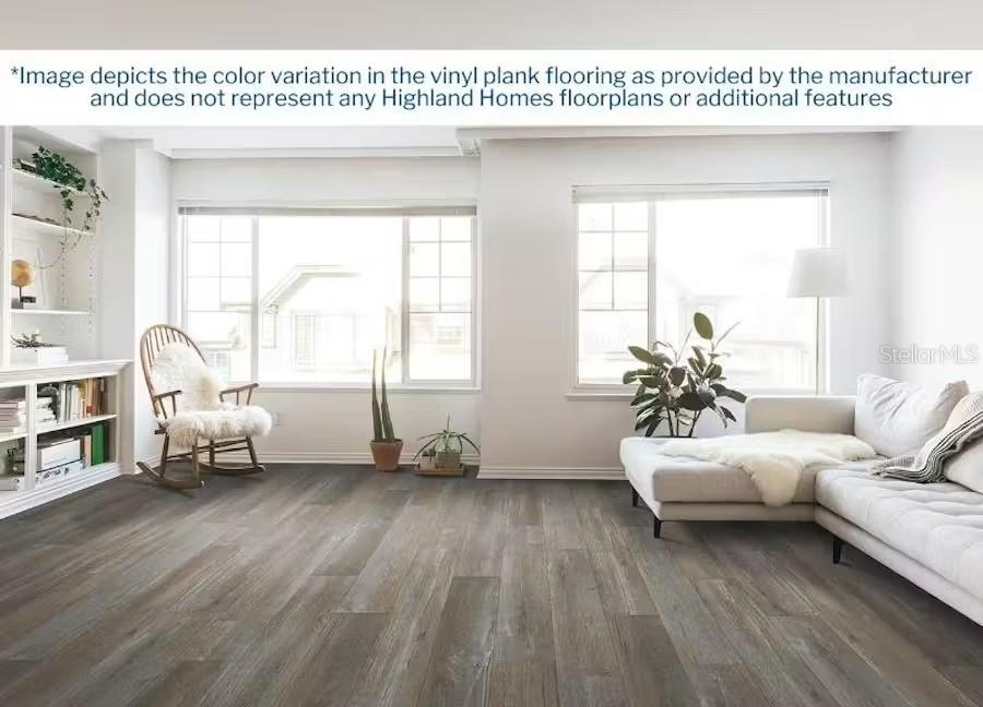 sitting room featuring wood finished floors and baseboards