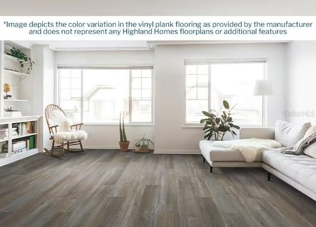 sitting room featuring wood finished floors and baseboards