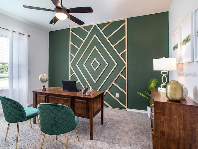 office with baseboards, ceiling fan, and carpet floors