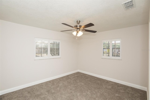 4008 S Carlisle Rd, Lakeland, FL 33813 - spare room with carpet, a ceiling fan, and a textured ceiling