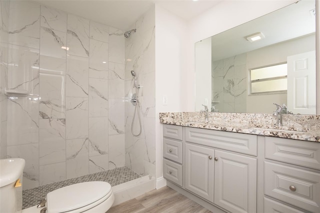 4008 S Carlisle Rd, Lakeland, FL 33813 - full bathroom with vanity, a marble finish shower, and wood finished floors