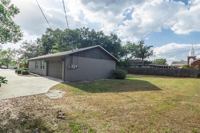 4008 S Carlisle Rd, Lakeland, FL 33813 - view of home's exterior with concrete driveway and a garage