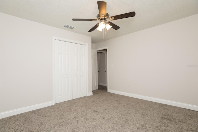 4008 S Carlisle Rd, Lakeland, FL 33813 - unfurnished bedroom featuring light carpet, a closet, and a ceiling fan