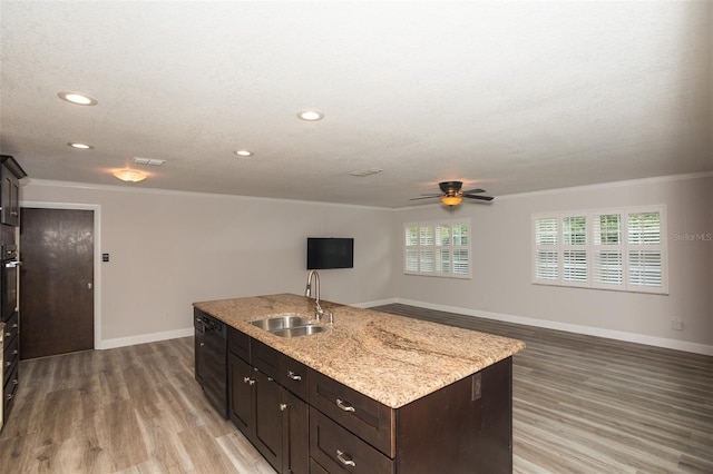 4008 S Carlisle Rd, Lakeland, FL 33813 - kitchen with black appliances, light wood finished floors, ornamental molding, recessed lighting, and ceiling fan