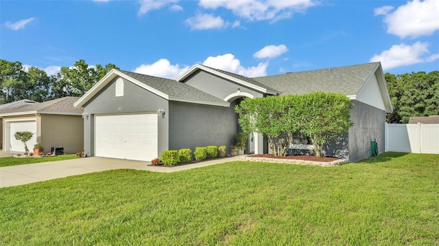 242 Kings Pond Ave SW, Winter Haven, FL 33880 - ranch-style home with an attached garage, concrete driveway, roof with shingles, and stucco siding