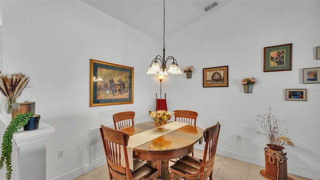 242 Kings Pond Ave SW, Winter Haven, FL 33880 - dining space featuring baseboards, light tile patterned flooring, and a chandelier