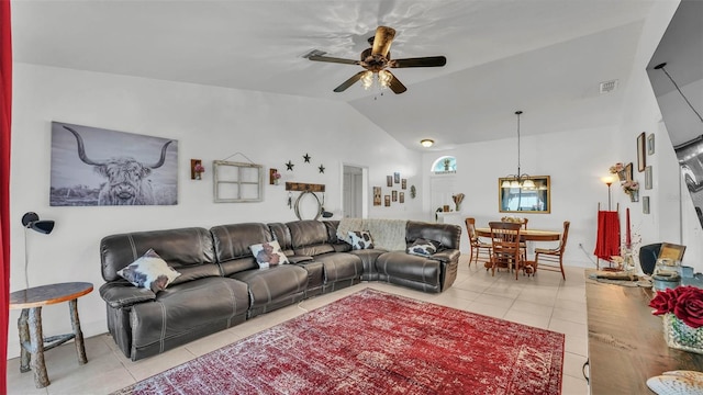 242 Kings Pond Ave SW, Winter Haven, FL 33880 - living area featuring light tile patterned floors, lofted ceiling, and a ceiling fan