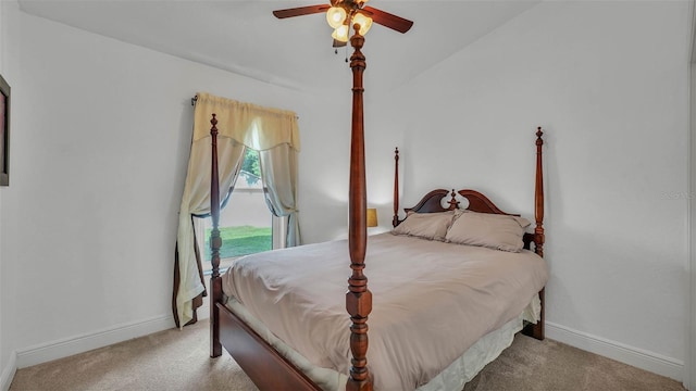242 Kings Pond Ave SW, Winter Haven, FL 33880 - bedroom with carpet flooring, baseboards, and ceiling fan