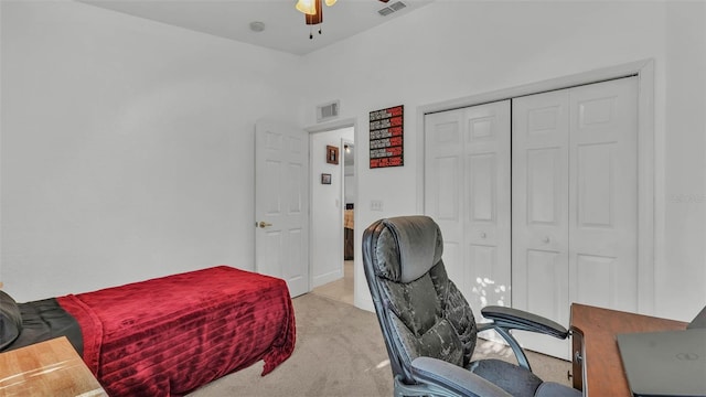 242 Kings Pond Ave SW, Winter Haven, FL 33880 - bedroom featuring light carpet, a closet, ceiling fan, and an office area
