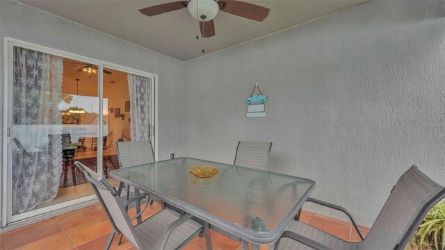 242 Kings Pond Ave SW, Winter Haven, FL 33880 - dining room with ceiling fan and tile patterned floors