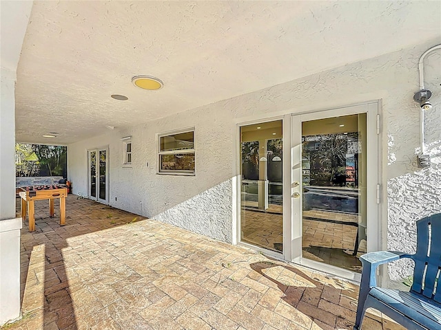 view of patio / terrace featuring french doors