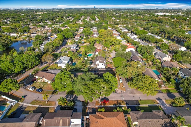 aerial view featuring a water view and a residential view