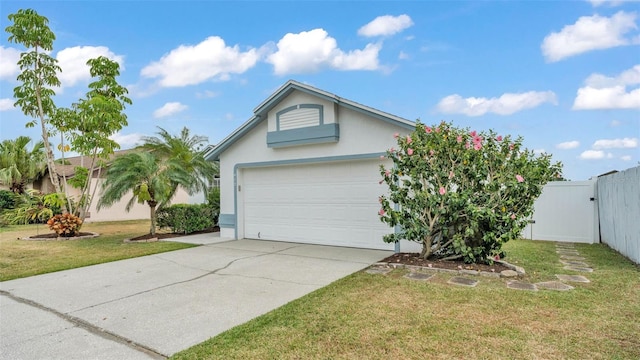 single story home with driveway, stucco siding, a gate, and a garage