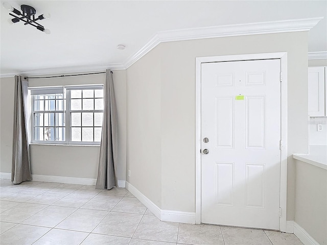 10764 Lenox Rd, Hollywood, FL 33026 - foyer entrance featuring ornamental molding, light tile patterned floors, and baseboards