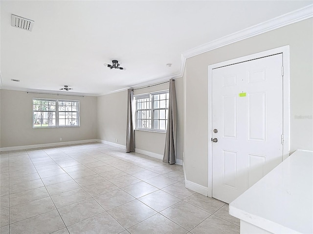 10764 Lenox Rd, Hollywood, FL 33026 - foyer entrance with ornamental molding, light tile patterned flooring, and baseboards