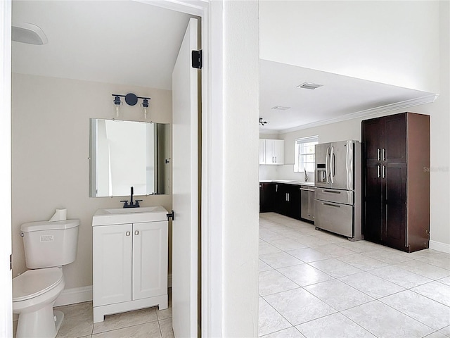 10764 Lenox Rd, Hollywood, FL 33026 - bathroom featuring baseboards, tile patterned floors, vanity, toilet, and ornamental molding