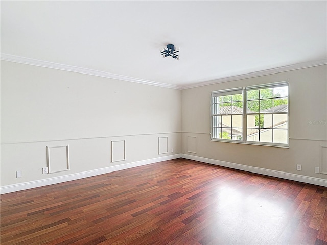 10764 Lenox Rd, Hollywood, FL 33026 - empty room featuring crown molding and dark wood-style flooring