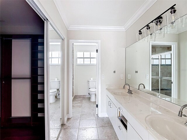 10764 Lenox Rd, Hollywood, FL 33026 - full bathroom with toilet, ornamental molding, baseboards, double vanity, and tile patterned flooring