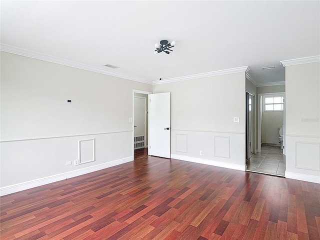 10764 Lenox Rd, Hollywood, FL 33026 - unfurnished room with wood finished floors, a decorative wall, ornamental molding, and wainscoting