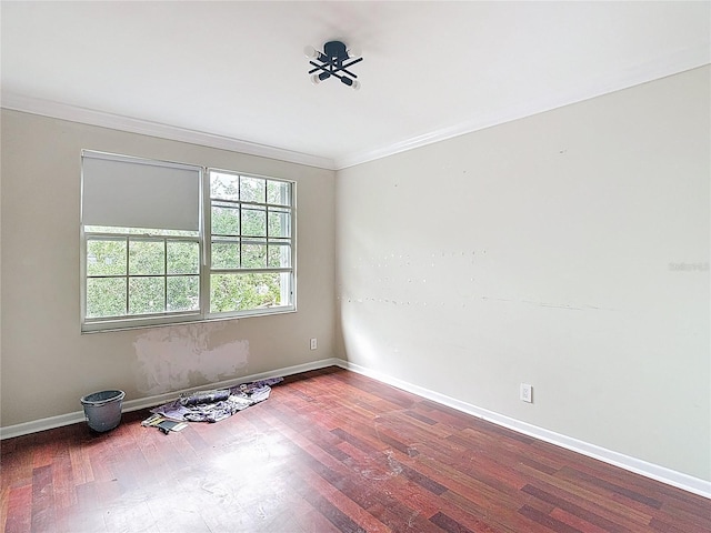 10764 Lenox Rd, Hollywood, FL 33026 - empty room featuring wood finished floors, crown molding, and baseboards