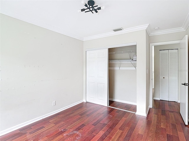 10764 Lenox Rd, Hollywood, FL 33026 - unfurnished bedroom with wood finished floors, ornamental molding, a closet, and baseboards