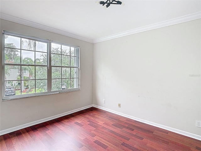 10764 Lenox Rd, Hollywood, FL 33026 - empty room featuring wood finished floors, baseboards, and crown molding